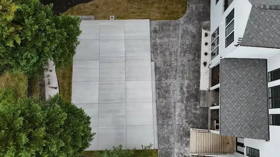 Large smooth concrete driveway in residential property