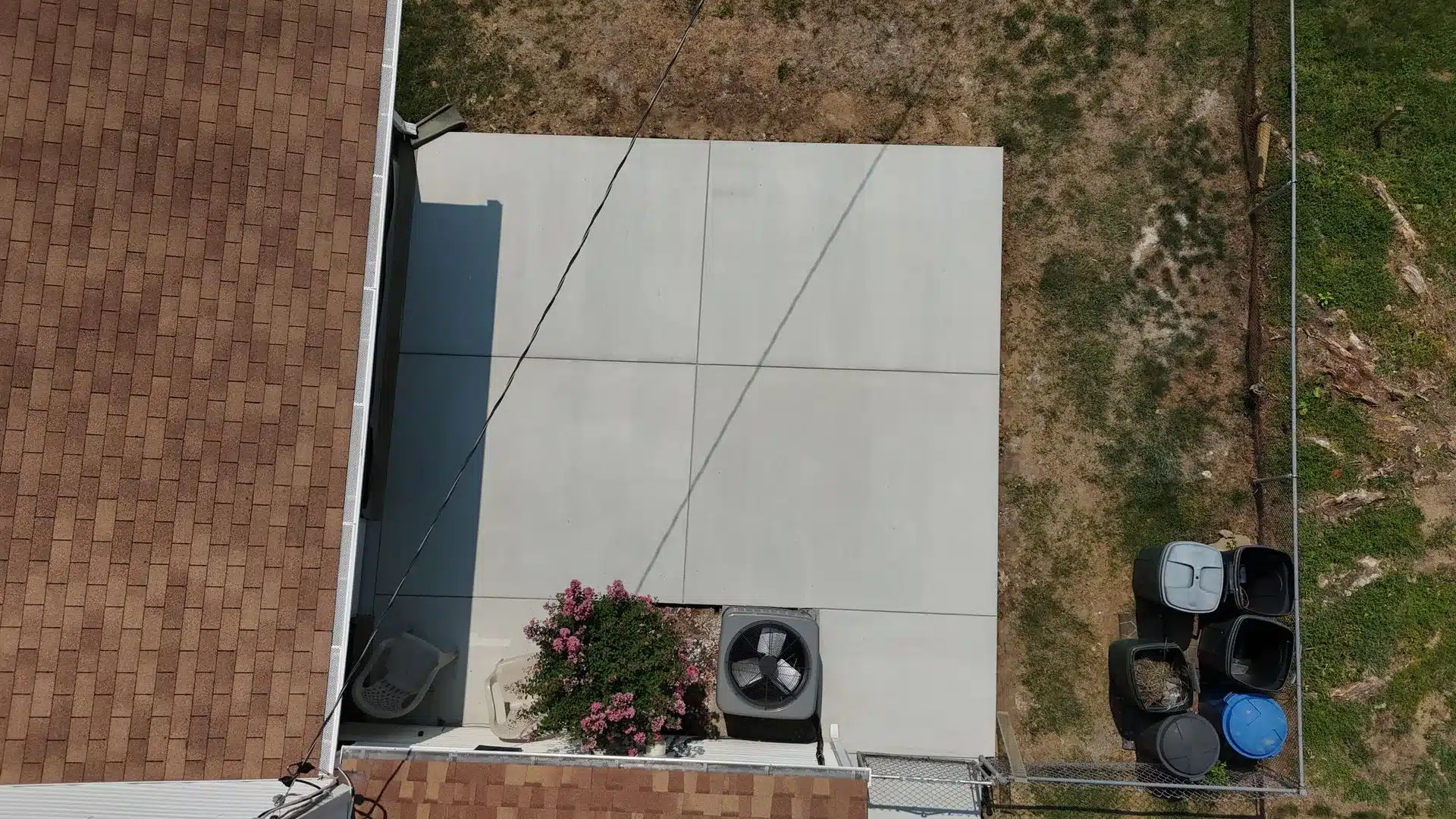 Aerial view of a completed Bright Concrete driveway and walkway project in Maryland